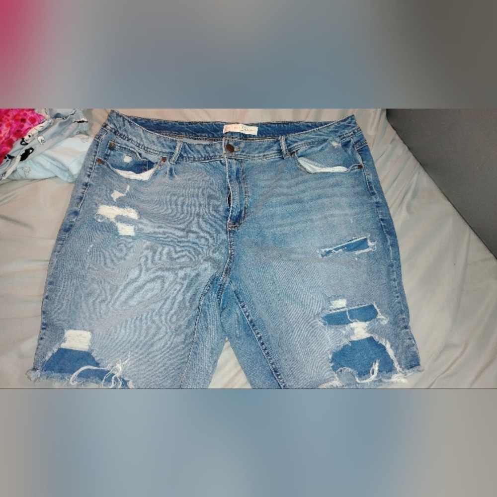 Distressed Blue Denim Jeans